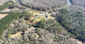 aerial view of Abercorn Creek water intake, river cutting through mostly forested area.